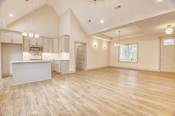 a living room with furniture and a table