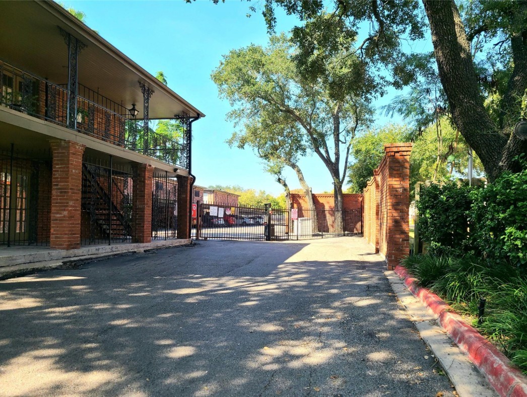 11550 Chimney Rock Road, Unit 205 Houston, TX 77035 - Photo 21 of 27 a view of a street with houses on both side