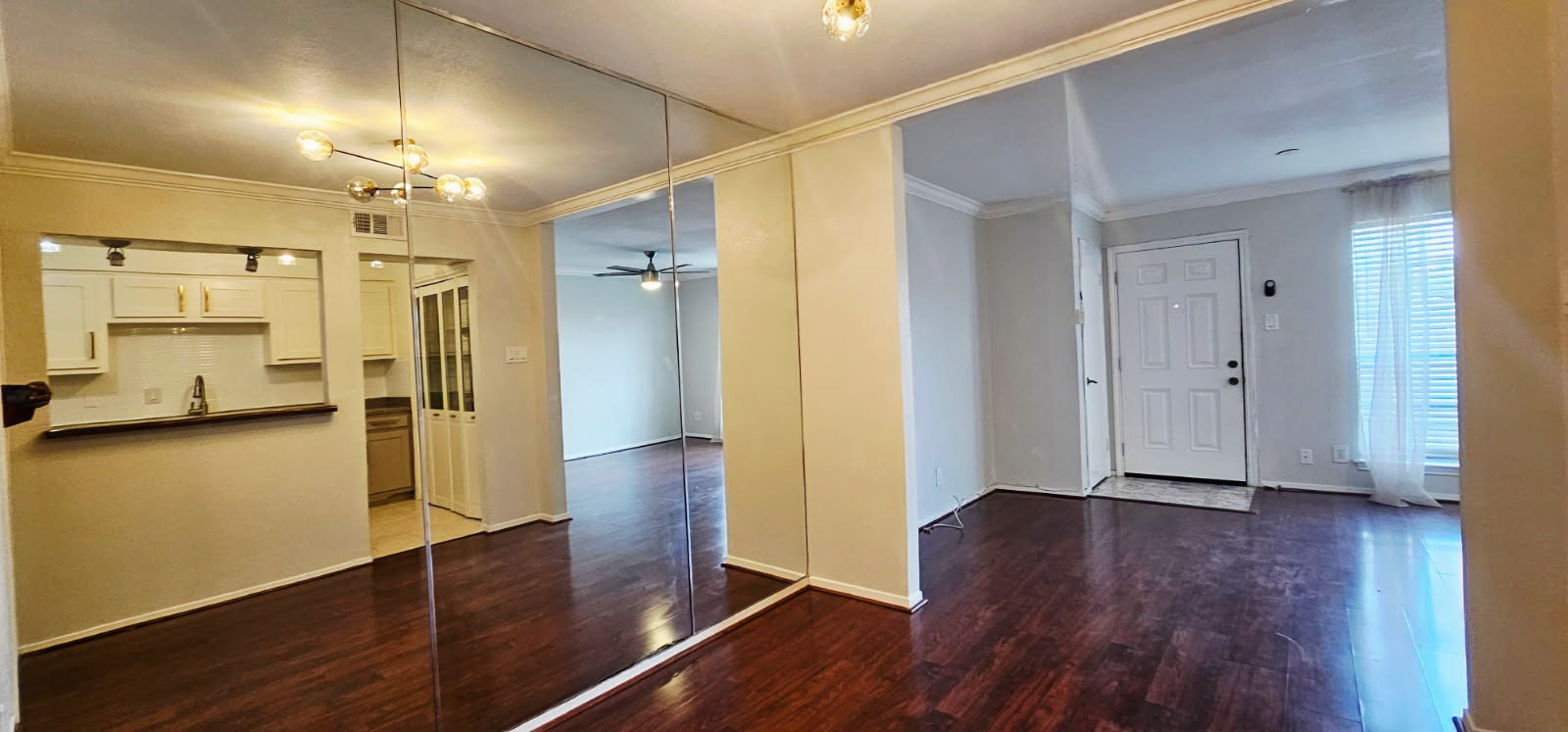 11550 Chimney Rock Road, Unit 205 Houston, TX 77035 - Photo 9 of 27 a view of a hallway with wooden floor