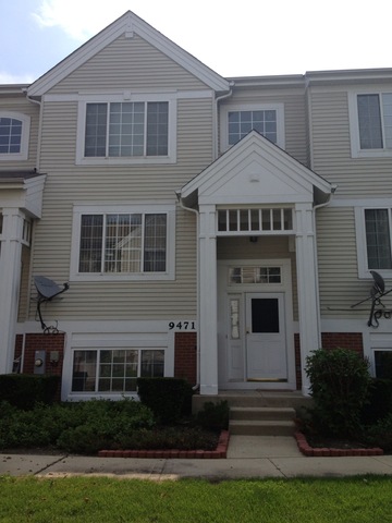 9471 Harrison Street Des Plaines, IL 60016 - Photo 1 of 9 a front view of a house with a yard