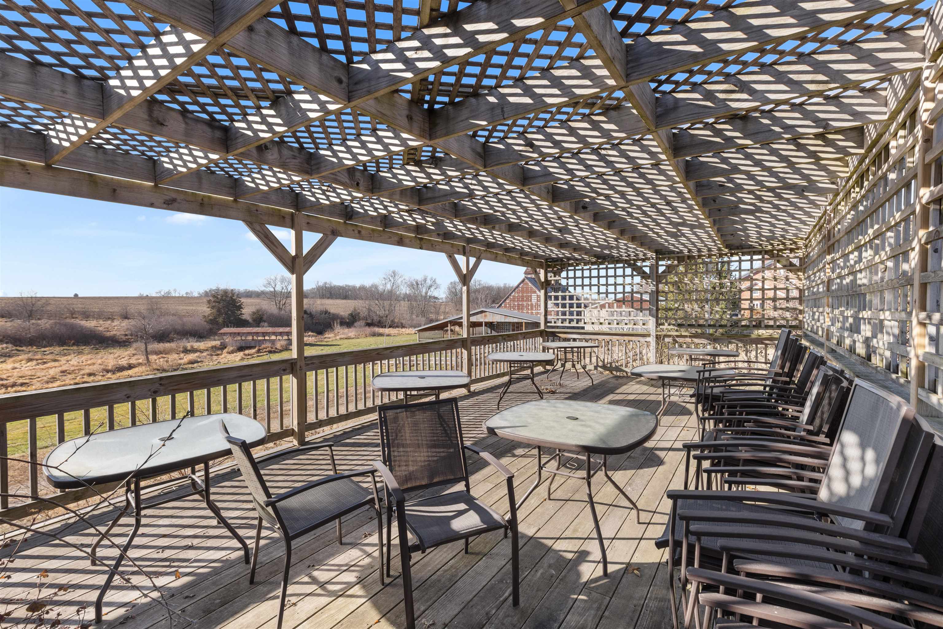 395 North Cedarville Road Freeport, IL 61032 - Photo 26 of 47 a view of a chairs in wooden deck