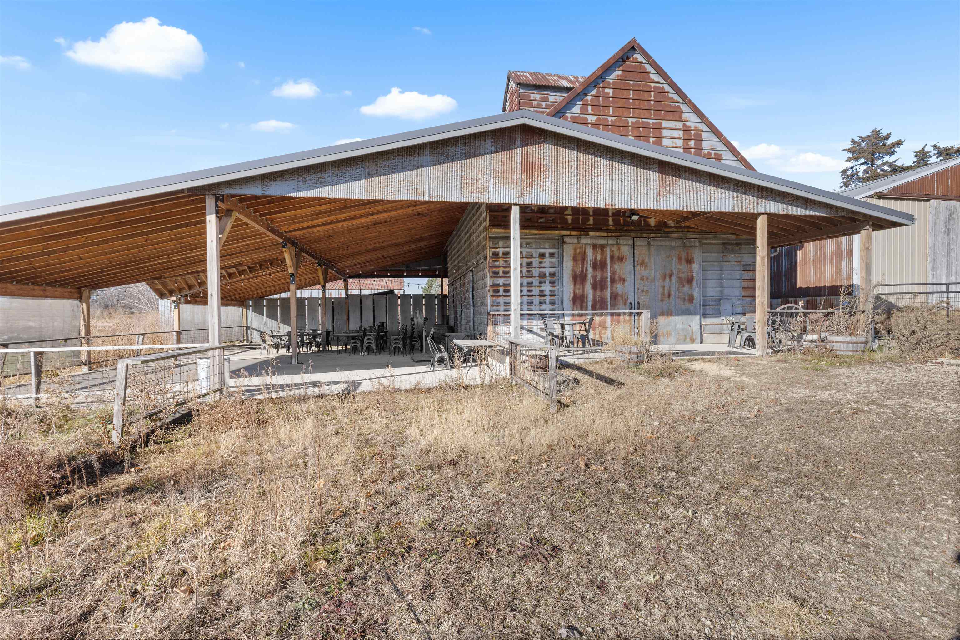 395 North Cedarville Road Freeport, IL 61032 - Photo 30 of 47 a front view of a house with a yard outdoor seating and barbeque oven