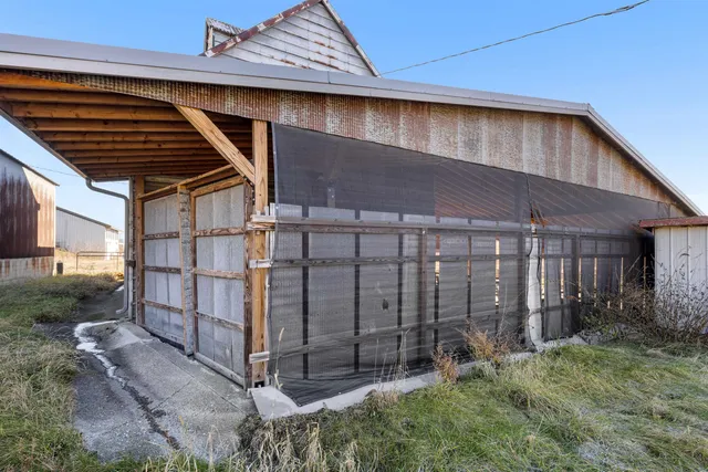 a backyard of a house with lots of green space