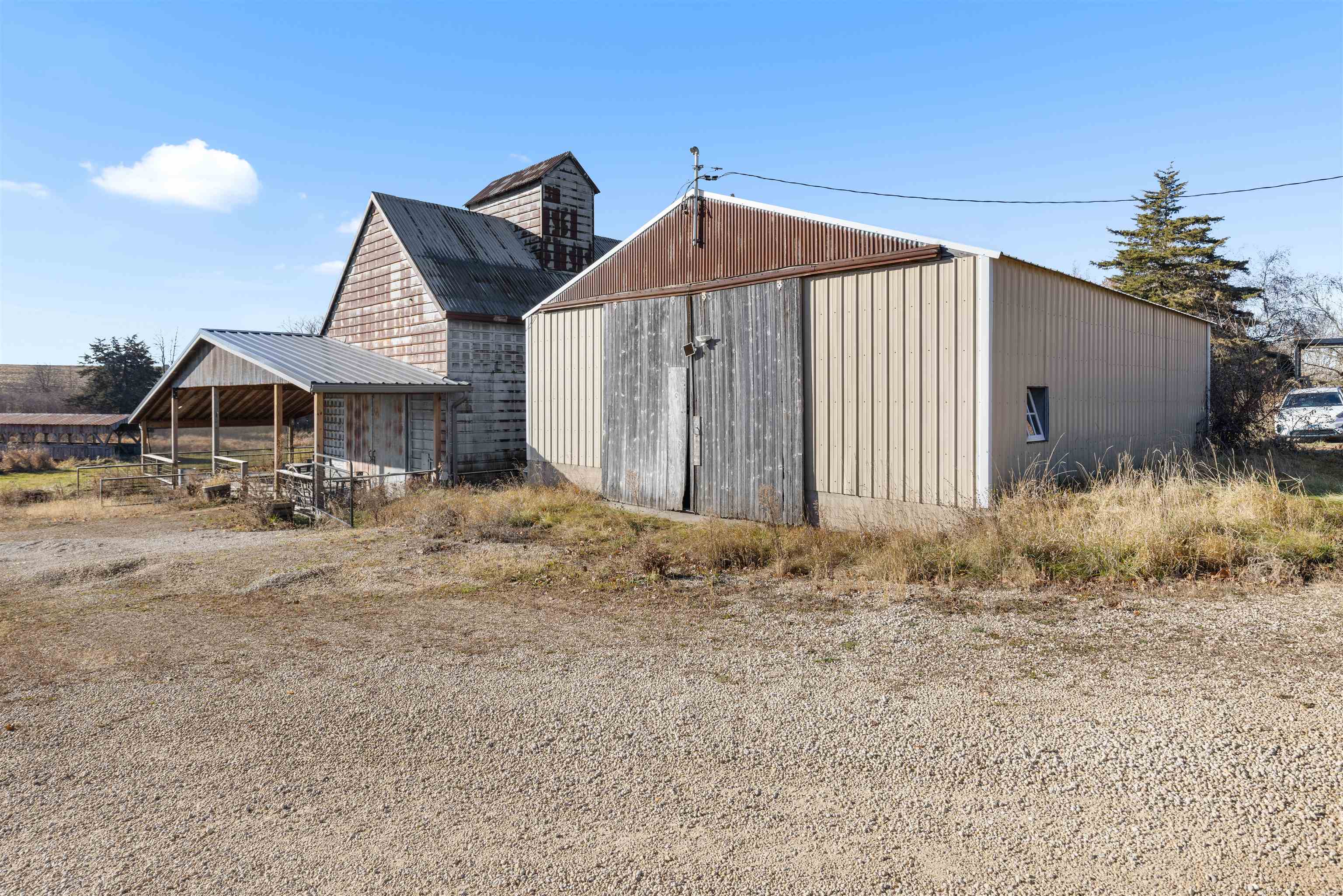 395 North Cedarville Road Freeport, IL 61032 - Photo 35 of 47 a house with trees in front of it