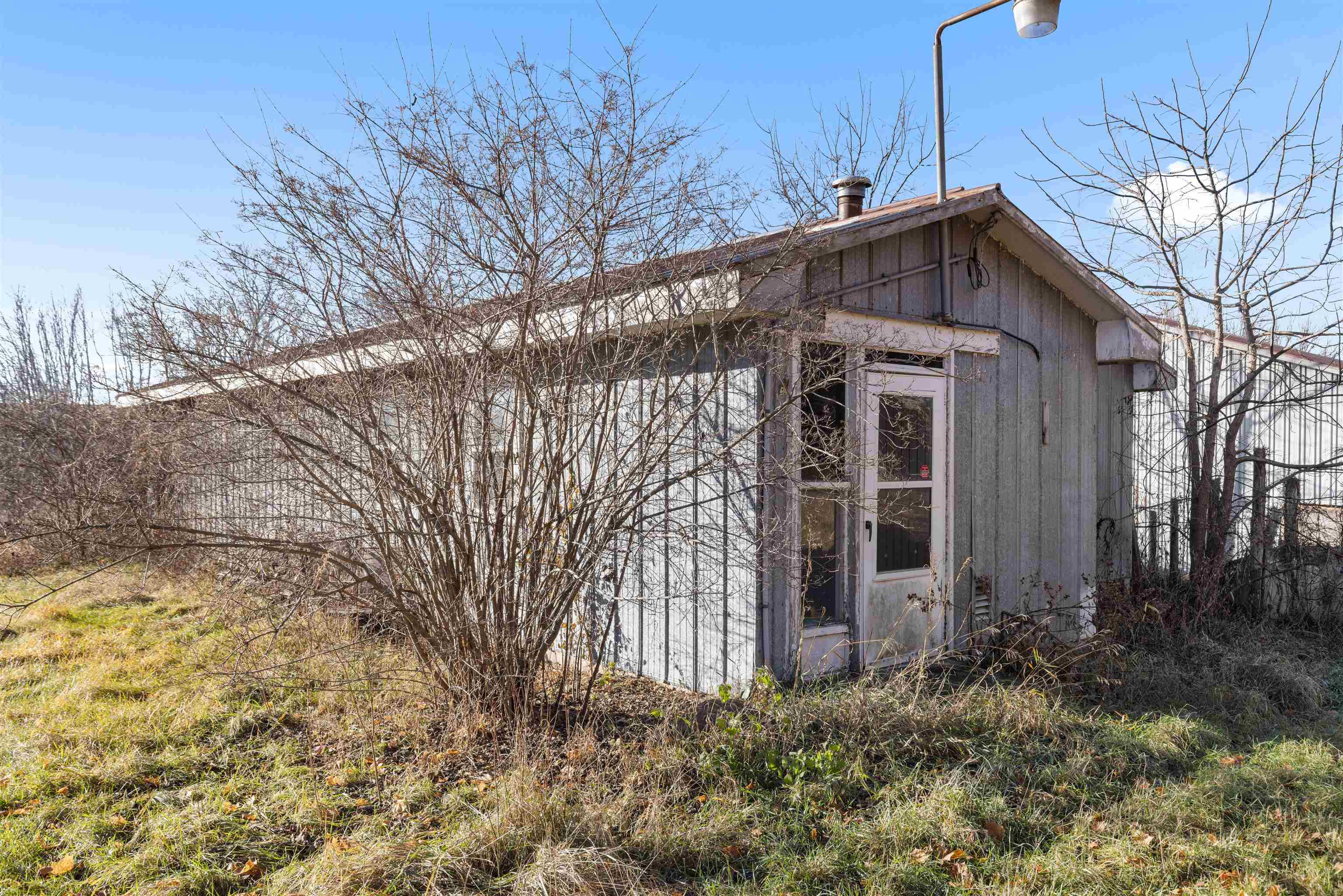 395 North Cedarville Road Freeport, IL 61032 - Photo 38 of 47 a front view of a house with garden