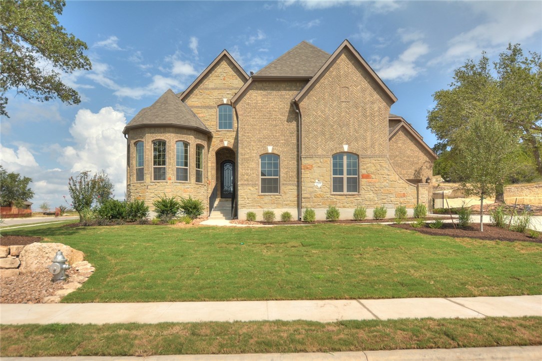 2309 Legend Trail Leander, TX 78641 - Photo 1 of 1 a front view of a house with a yard