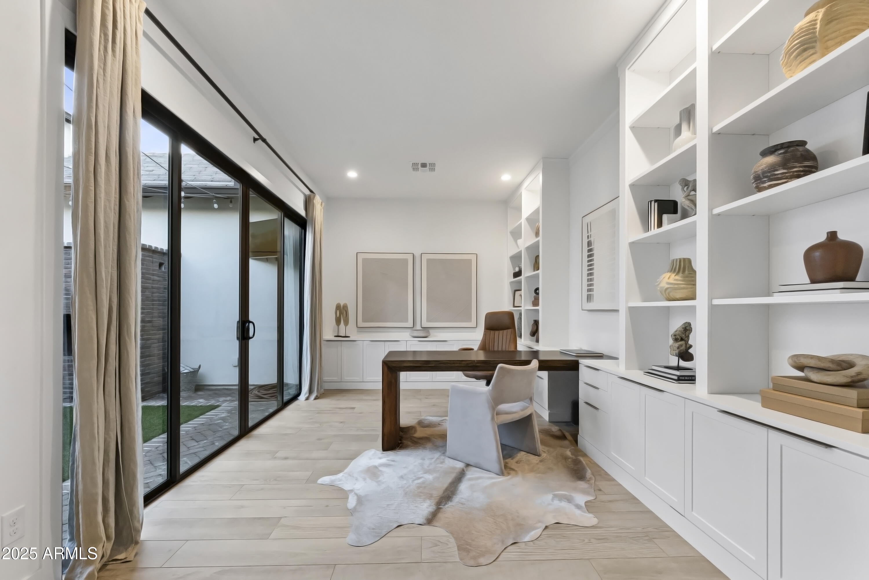 2753 East Hummingbird Way Gilbert, AZ 85297 - Photo 11 of 44 a living room with stainless steel appliances furniture cabinets and a rug