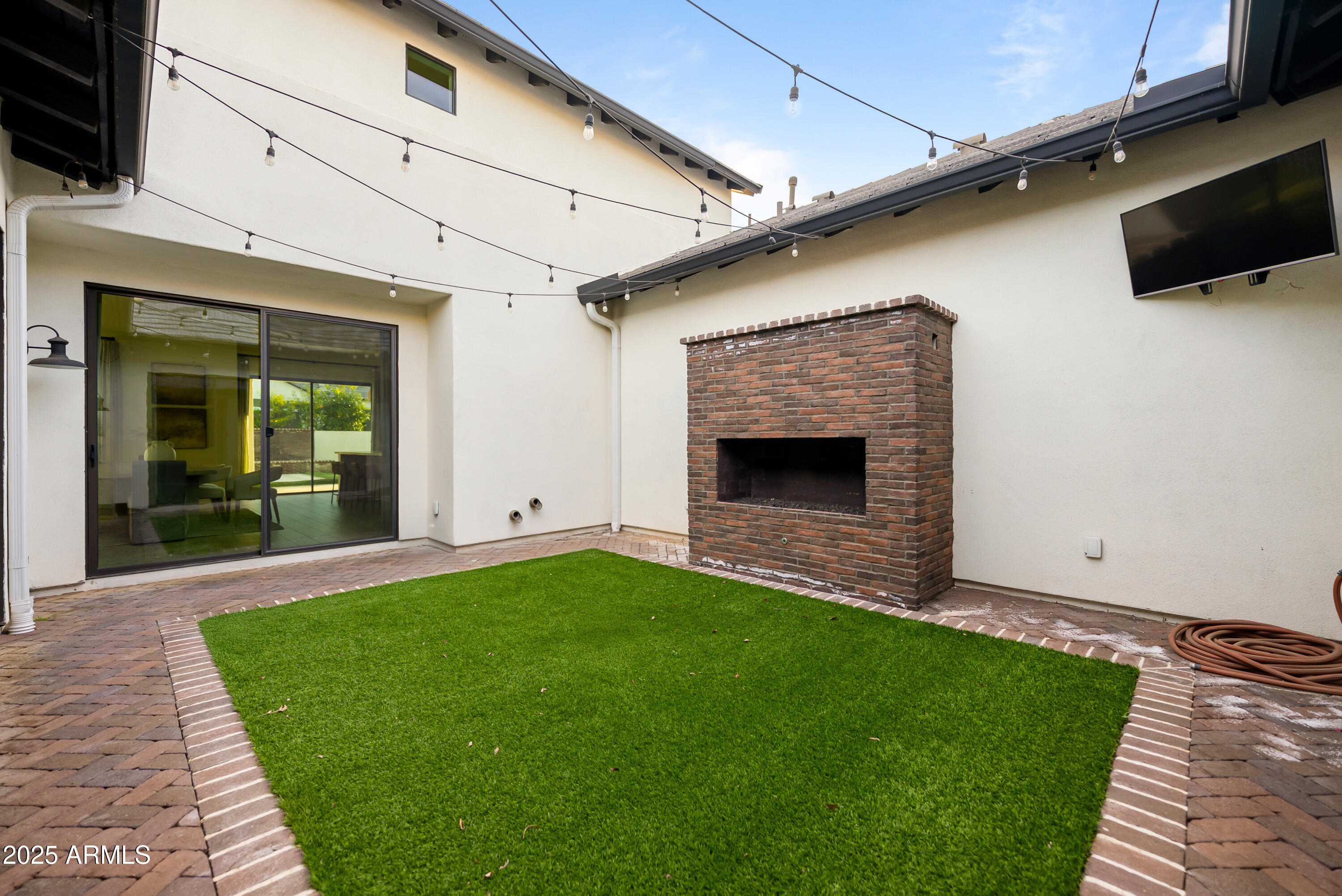 2753 East Hummingbird Way Gilbert, AZ 85297 - Photo 15 of 44 a front view of a house with a yard