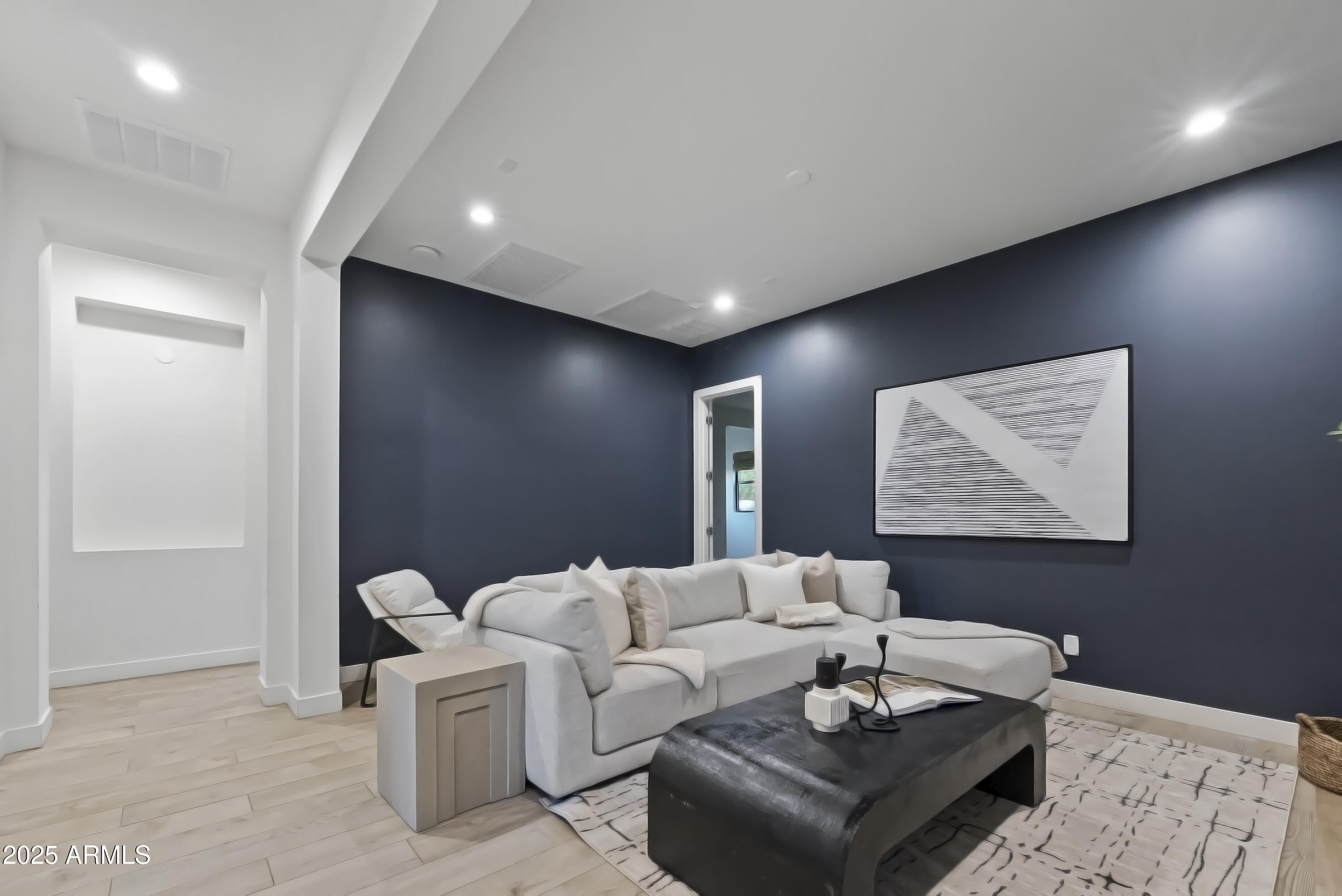 2753 East Hummingbird Way Gilbert, AZ 85297 - Photo 17 of 44 a living room with couches and a coffee table