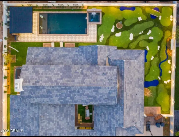 a swimming pool with some trees in the background