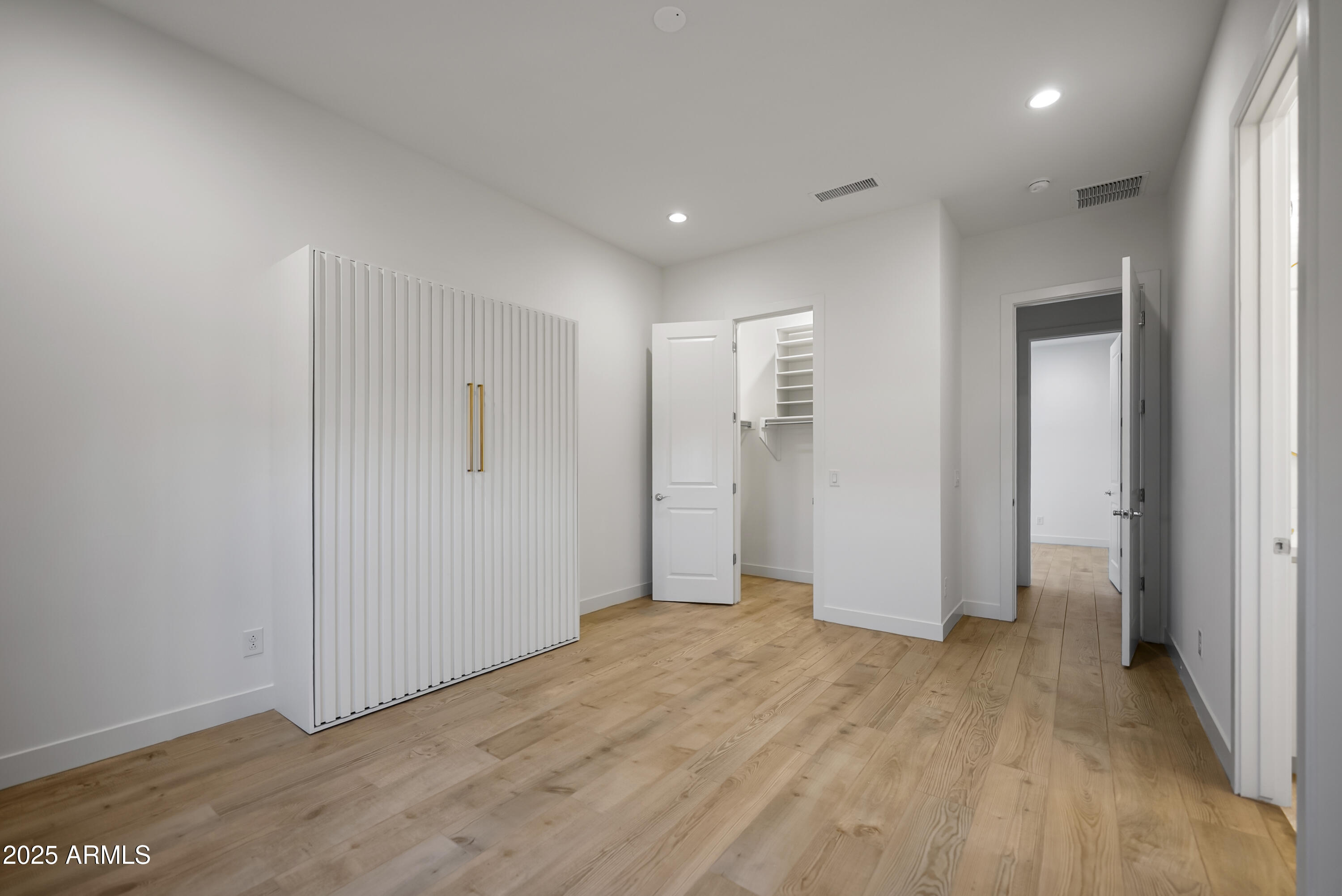 2753 East Hummingbird Way Gilbert, AZ 85297 - Photo 27 of 44 a view of hallway with wooden floor
