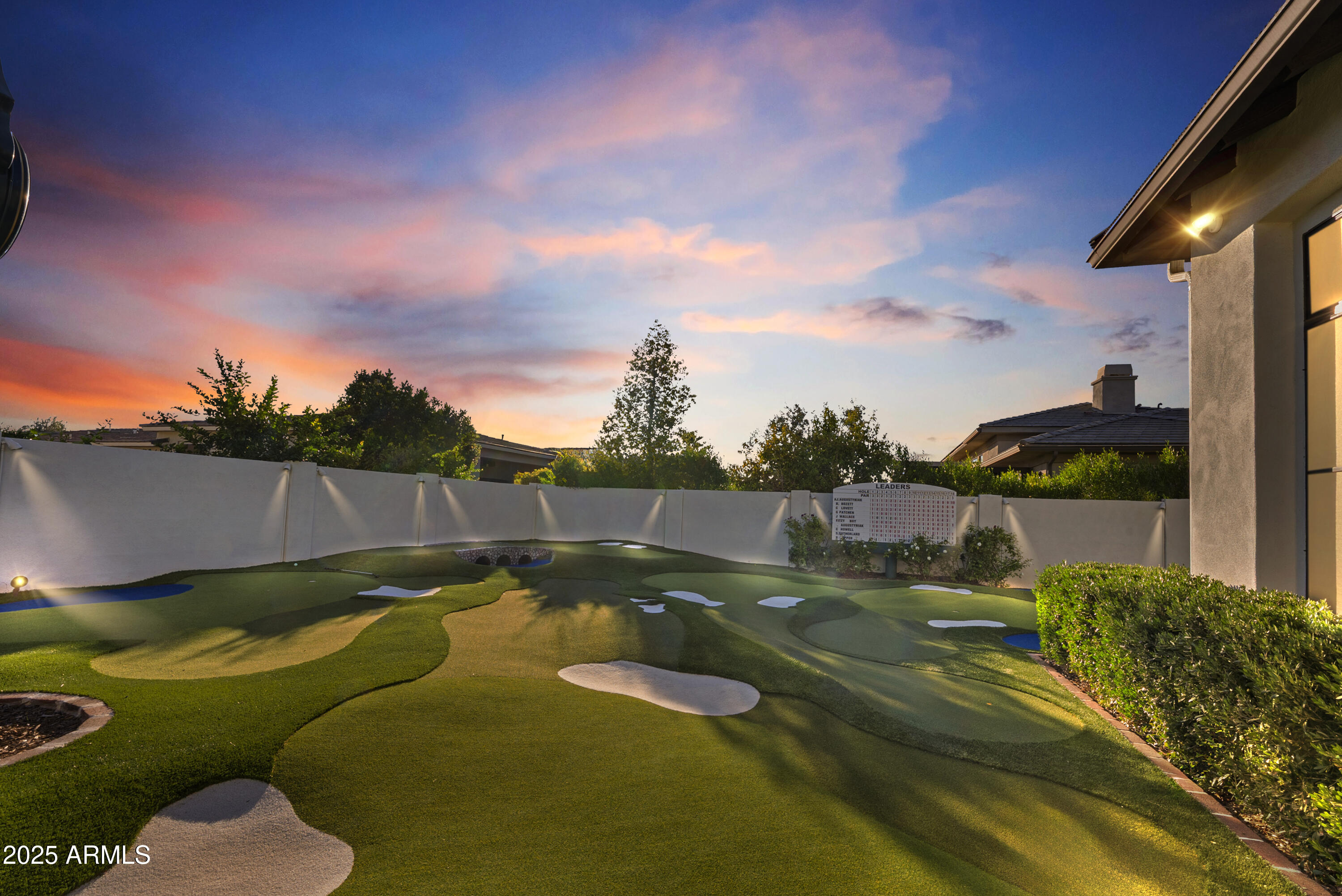 2753 East Hummingbird Way Gilbert, AZ 85297 - Photo 3 of 44 a view of a swimming pool with a yard