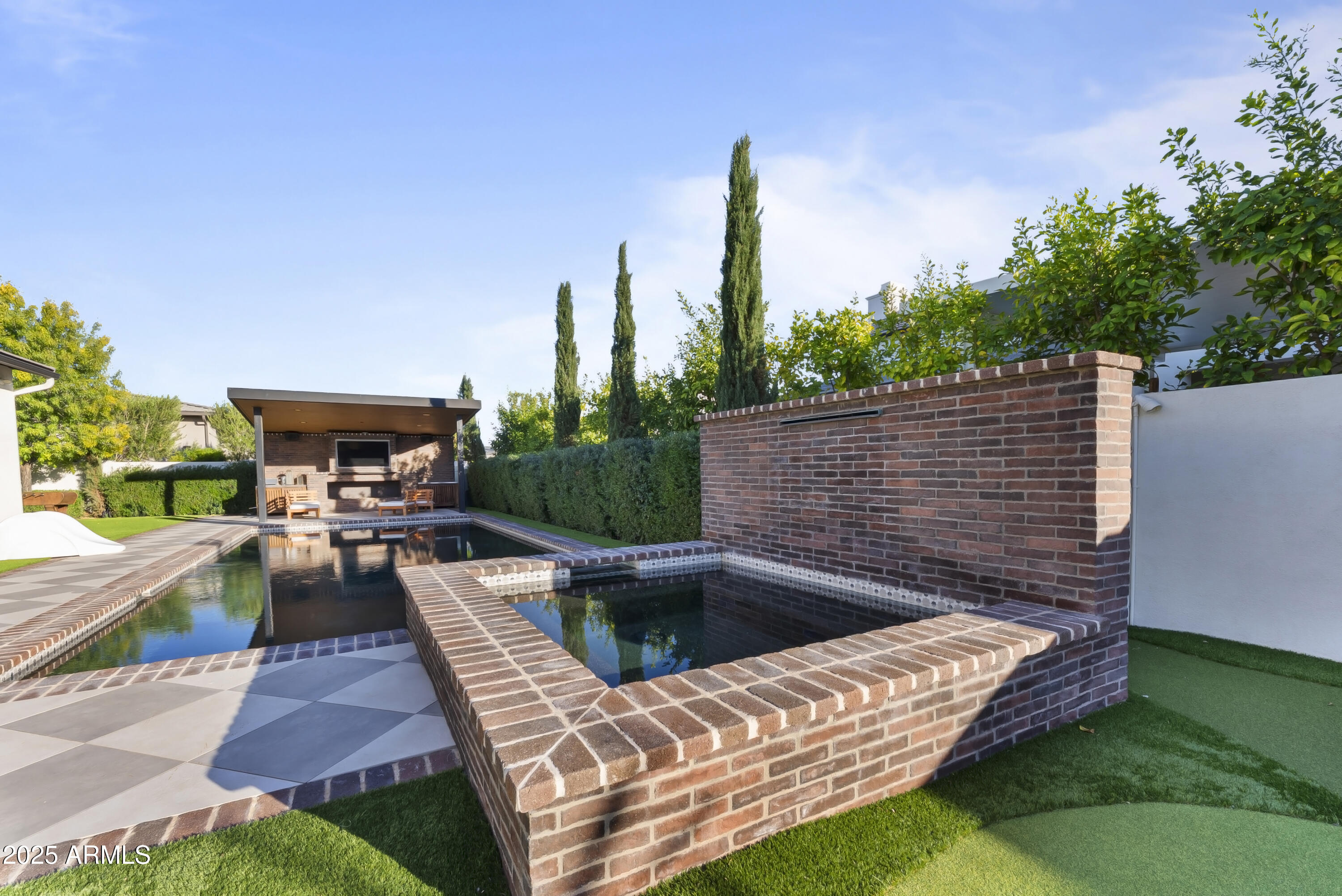 2753 East Hummingbird Way Gilbert, AZ 85297 - Photo 36 of 44 a view of outdoor sitting area with furniture and garden