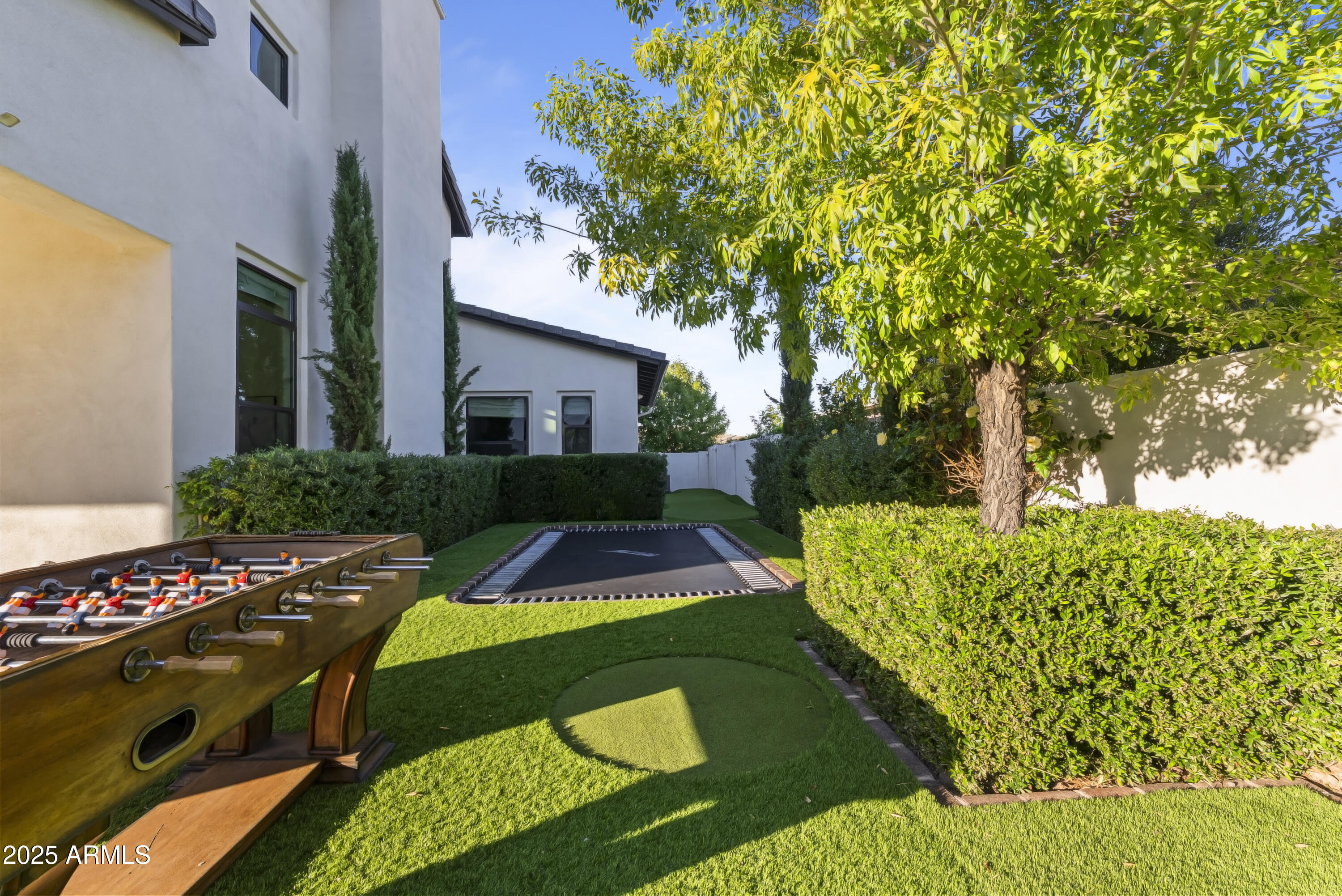 2753 East Hummingbird Way Gilbert, AZ 85297 - Photo 39 of 44 a view of a house with a yard
