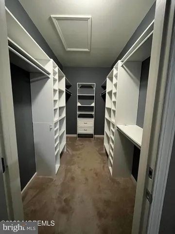 a view of an empty walk in closet