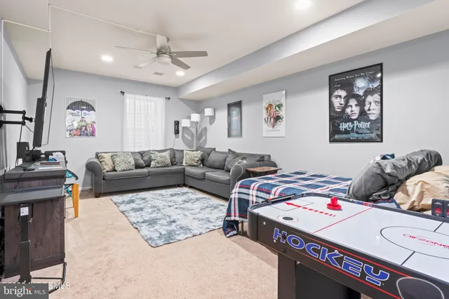 a living room with furniture and a couch