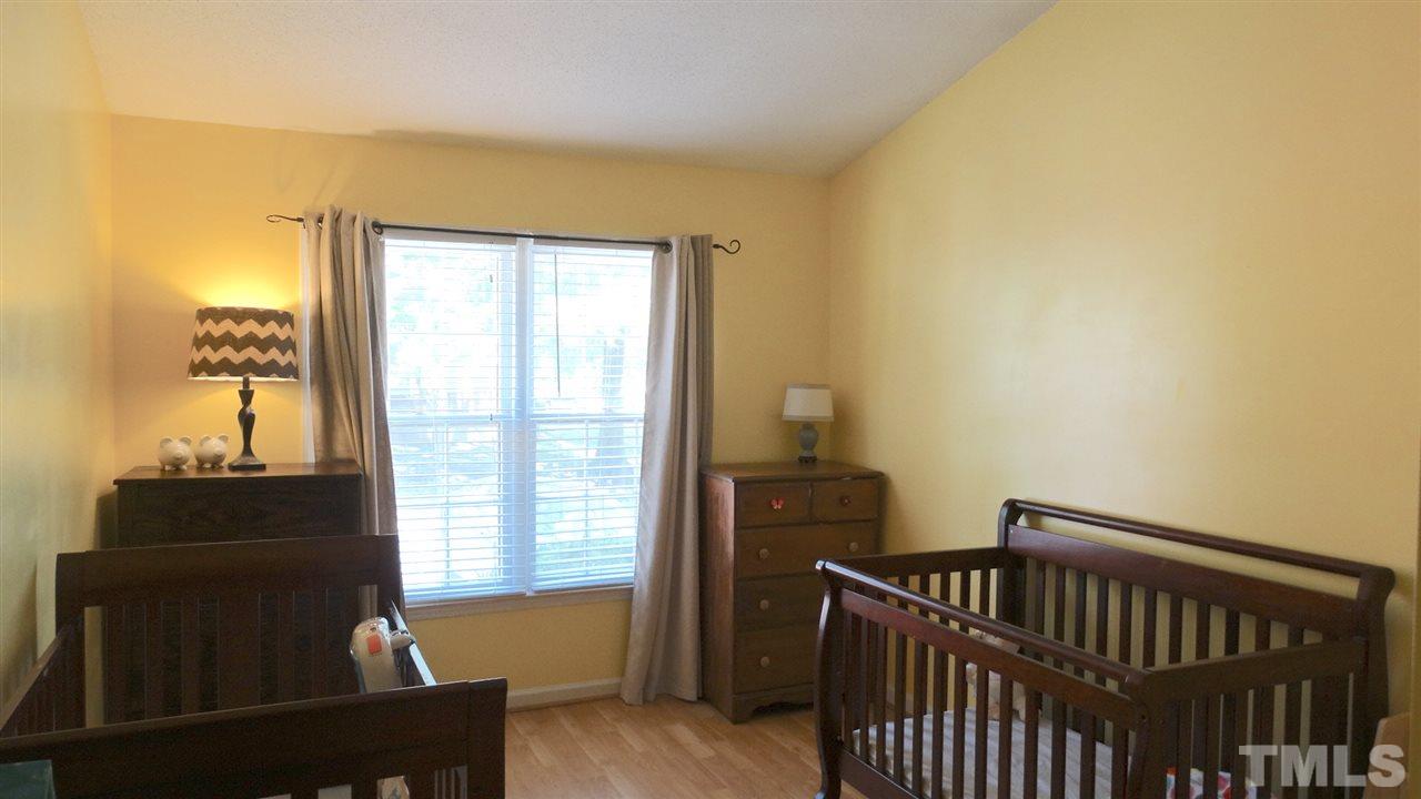 110 Shady Spring Place Durham, NC 27713 - Photo 11 of 22 Generous bedroom with vaulted ceiling located on first floor