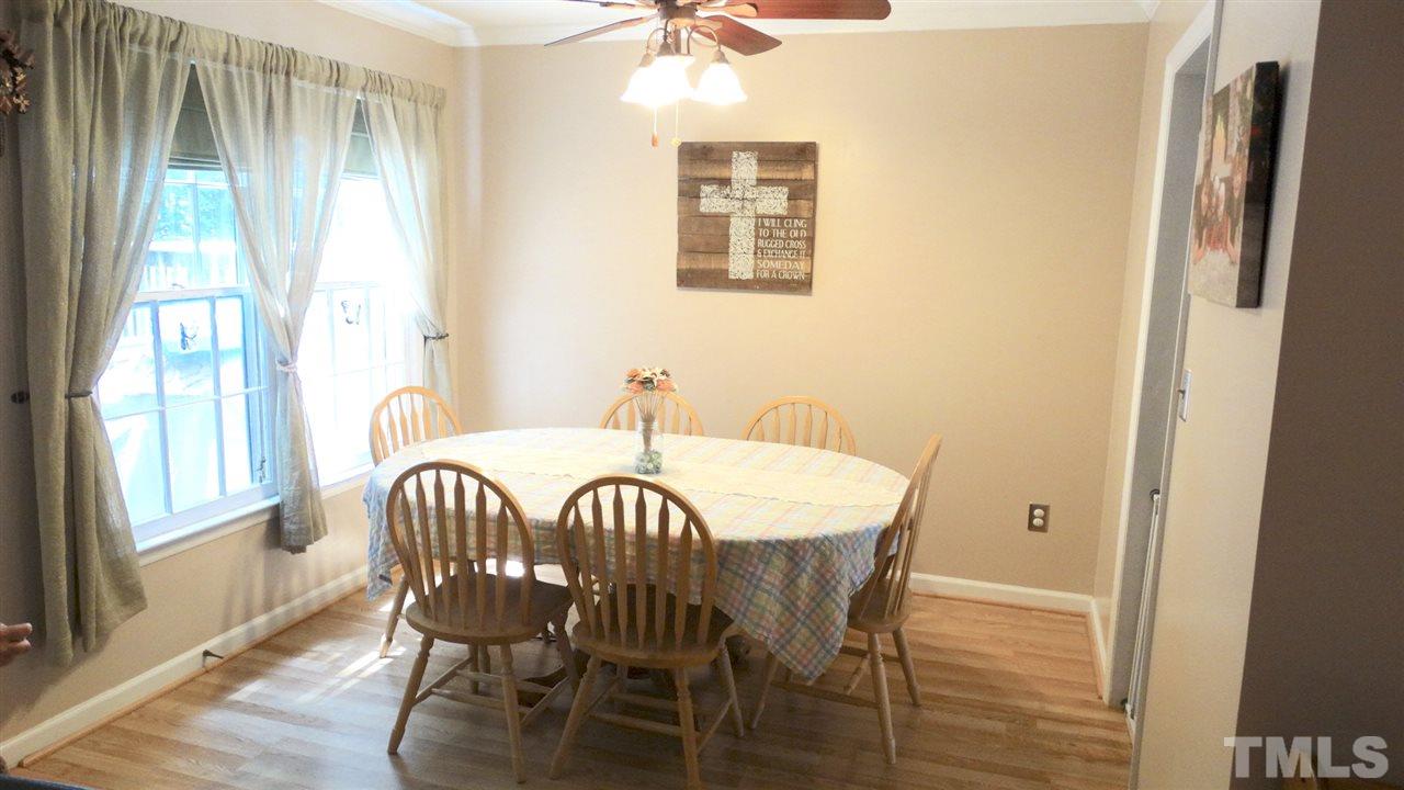 Formal Dining Room on the first floor overlooks the inviting deck.
