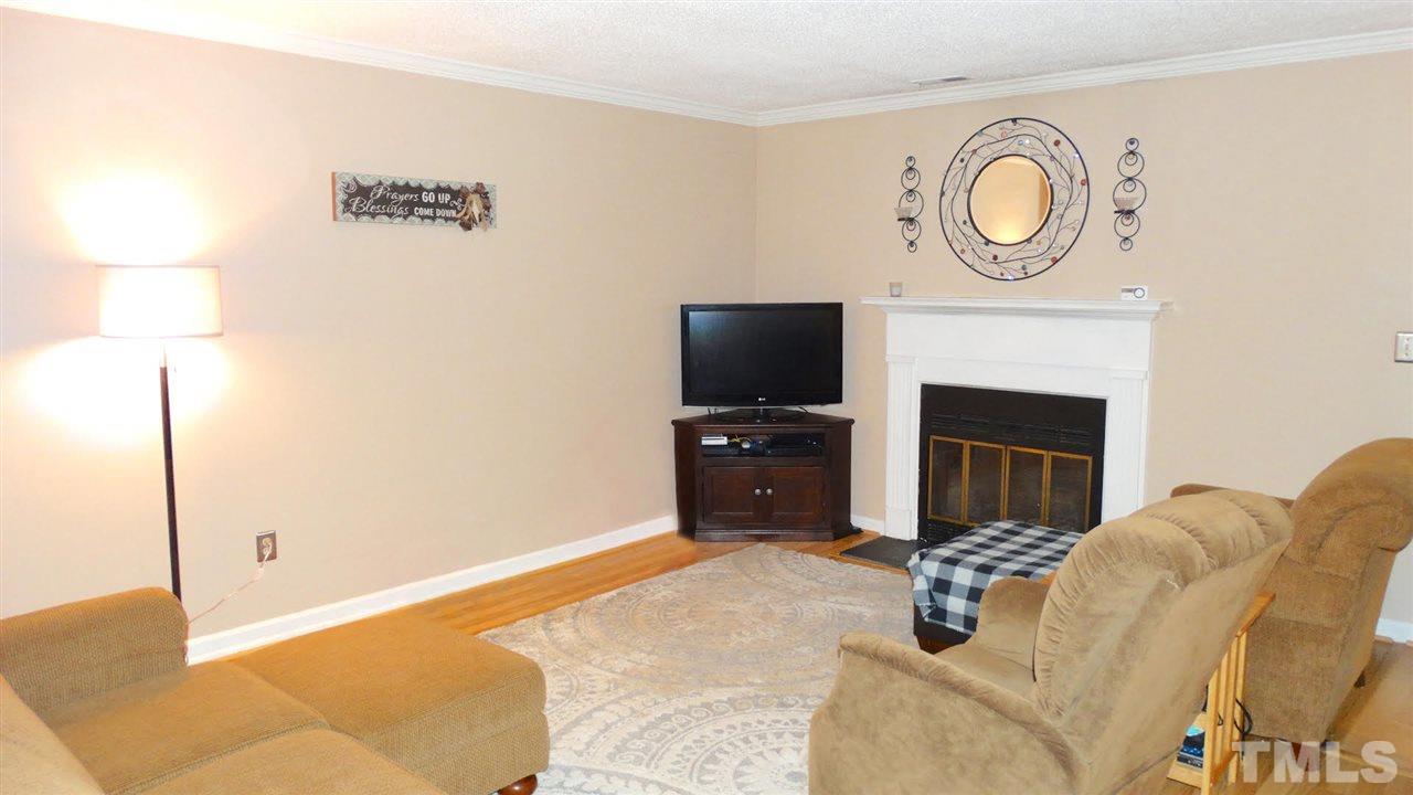 Generous Family Room has fireplace, plenty of room for furniture and activities