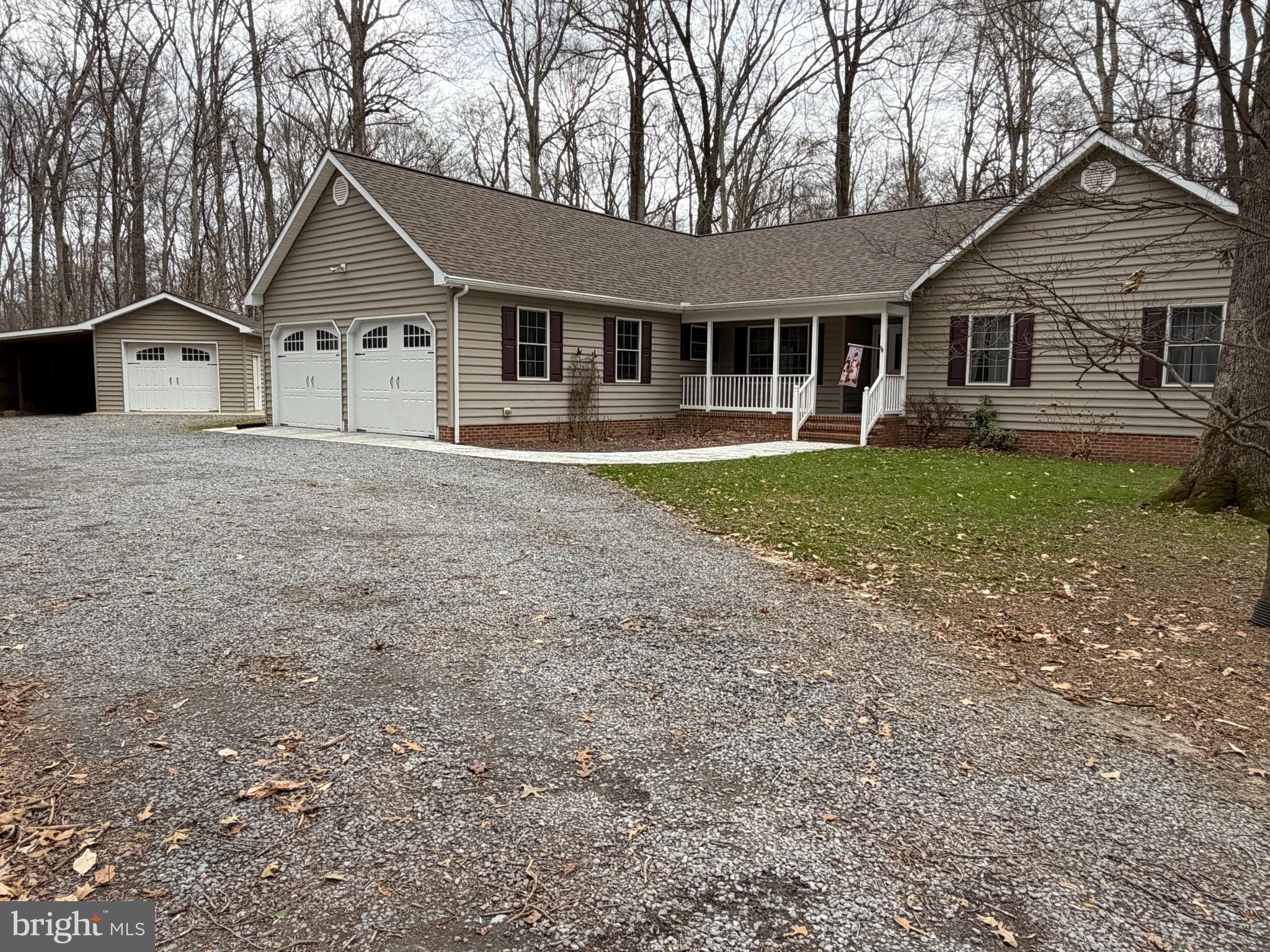 8664 Mitchell Road Denton, MD 21629 - Photo 2 of 19 Front exterior & Detached garage