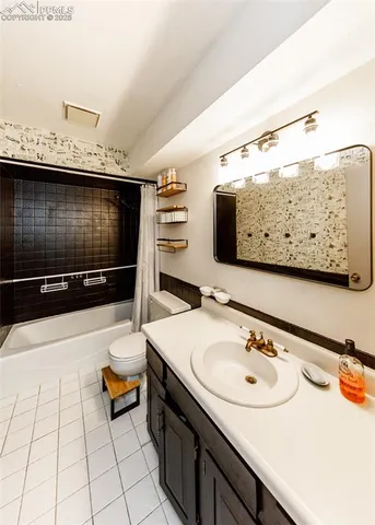 a bathroom with a sink double vanity and a mirror