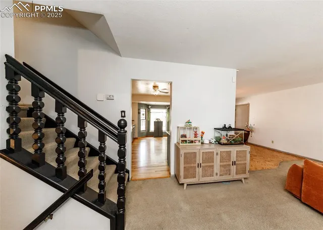 a view of livingroom with furniture and windows