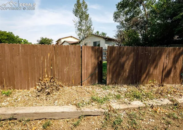 a view of wooden fence