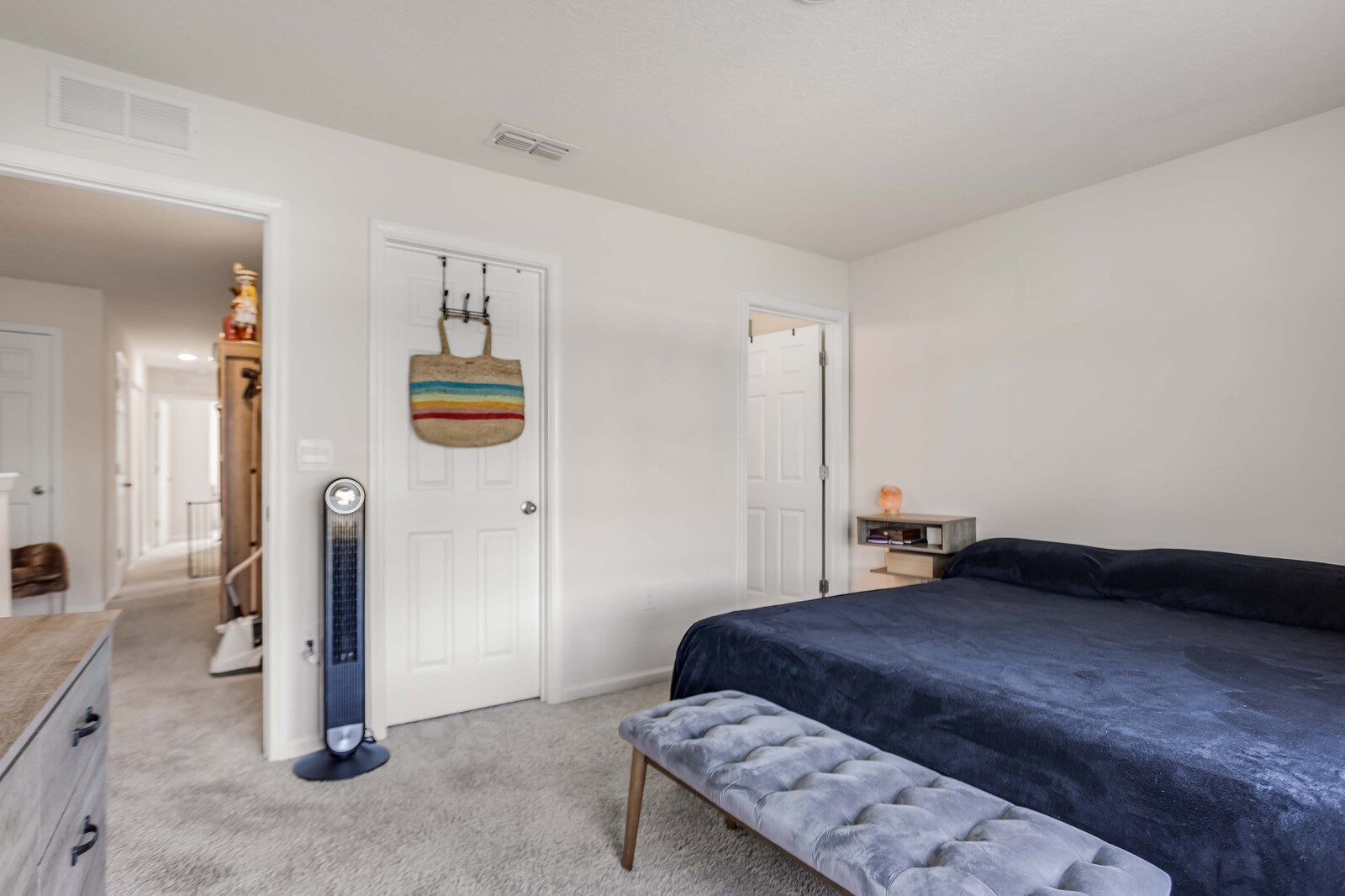 86784 Mainline Road Yulee, FL 32097 - Photo 10 of 25 a bedroom with a bed and wooden floor