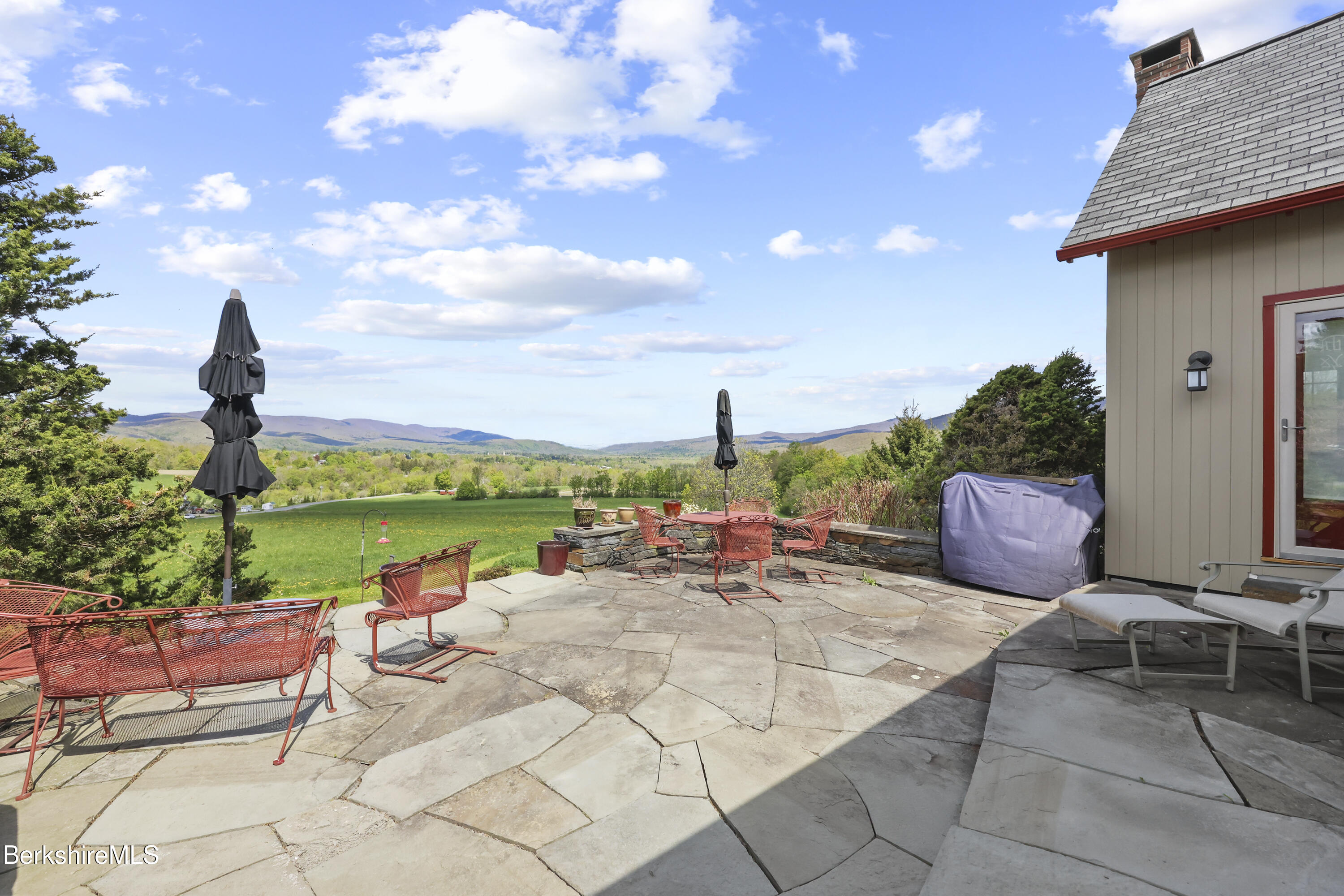 821 Pattison Road North Adams, MA 01247 - Photo 50 of 68 a view of a terrace with furniture and a garden