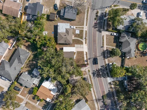 an aerial view of multiple houses with outdoor space