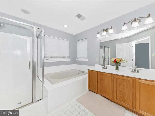 a view of workspace with furniture and a window