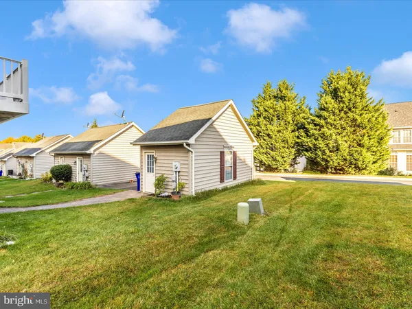 a view of a chairs on wooden deck