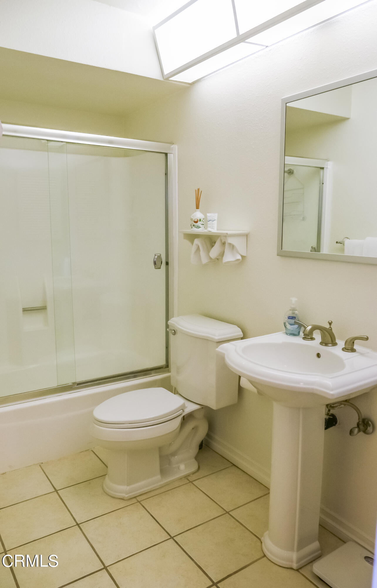 3101 Peninsula Road, Unit 307 Oxnard, CA 93035 - Photo 11 of 22 a bathroom with a sink toilet and shower