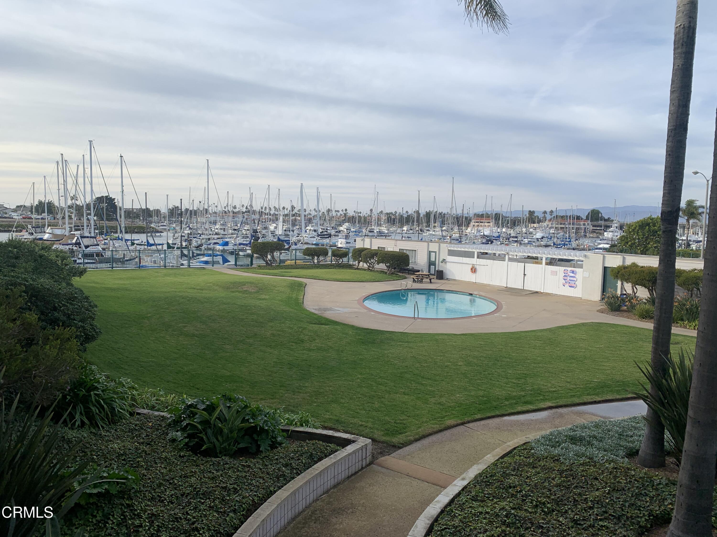 3101 Peninsula Road, Unit 307 Oxnard, CA 93035 - Photo 13 of 22 a view of a lake with a big yard