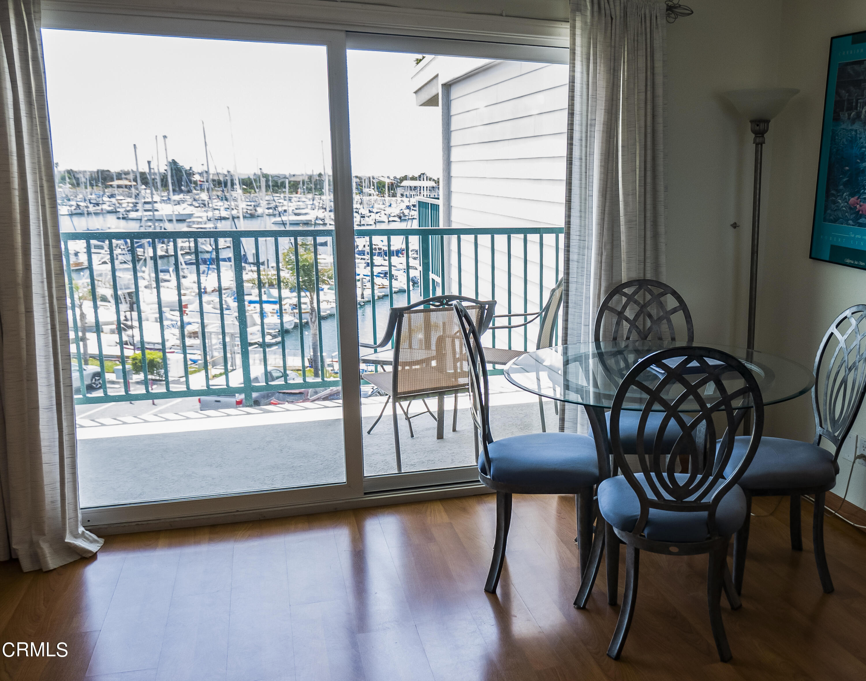 3101 Peninsula Road, Unit 307 Oxnard, CA 93035 - Photo 4 of 22 a view of a dining room with furniture and window