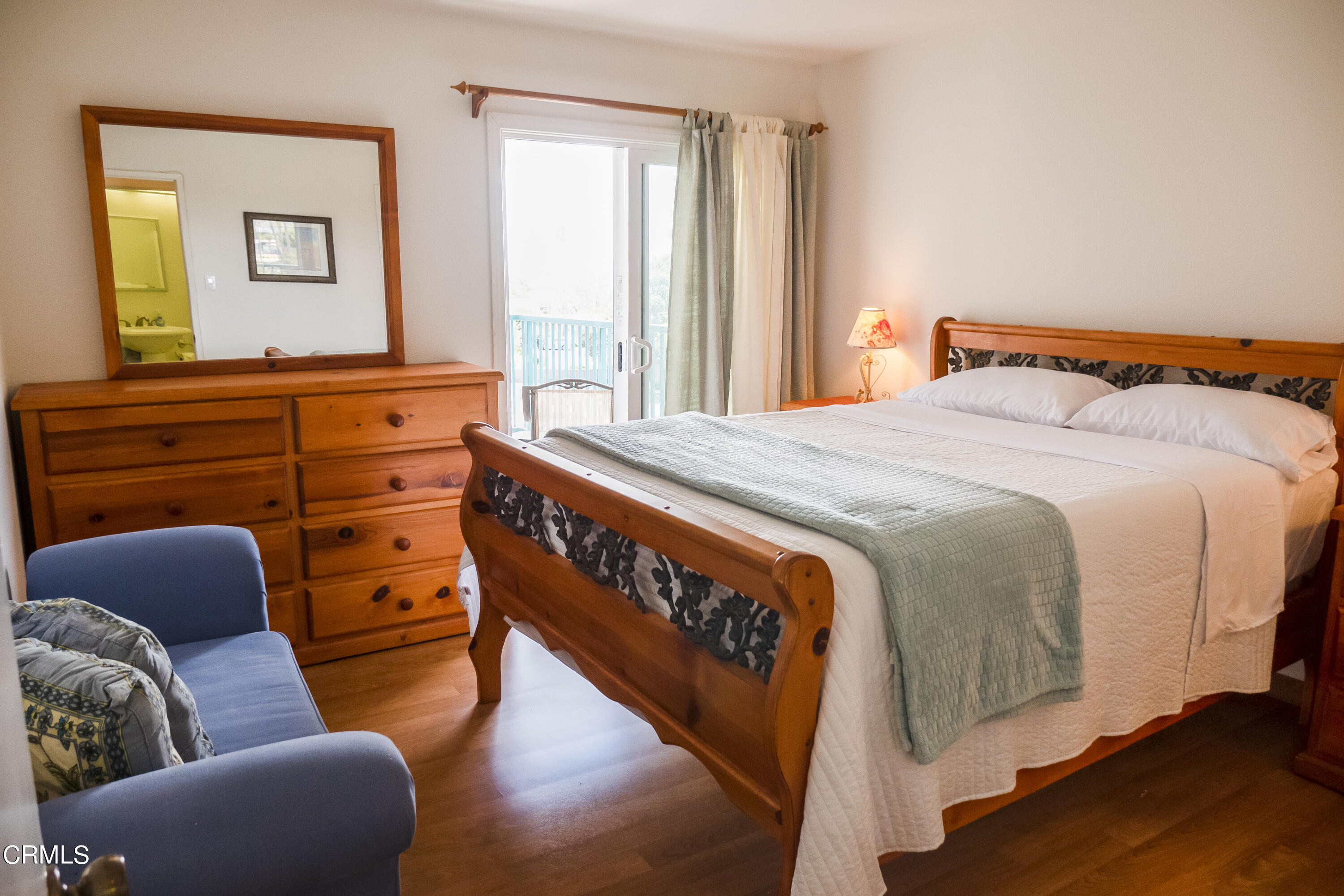 3101 Peninsula Road, Unit 307 Oxnard, CA 93035 - Photo 10 of 22 a bedroom with a bed and window