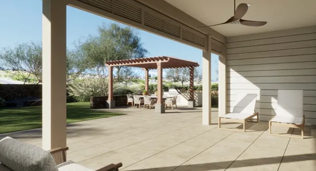 a view of a building with floor to ceiling windows and yard