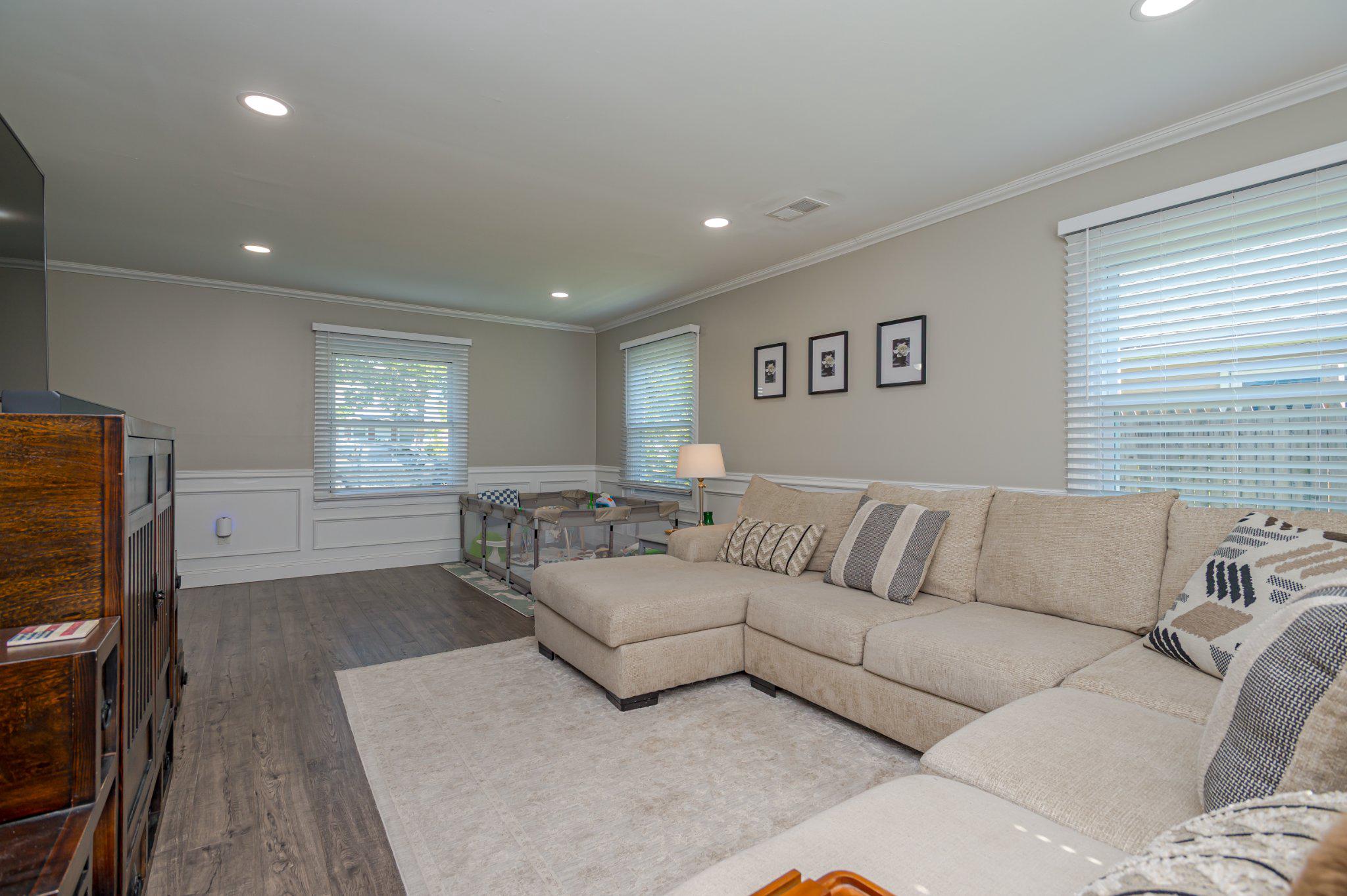 60 Midvale Lane Willingboro, NJ 08046 - Photo 5 of 24 a living room with furniture and a flat screen tv