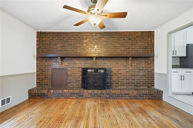 a living room with furniture and window