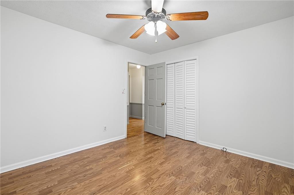 253 Newt Fowler Lane Canton, GA 30115 - Photo 27 of 35 wooden floor in an empty room