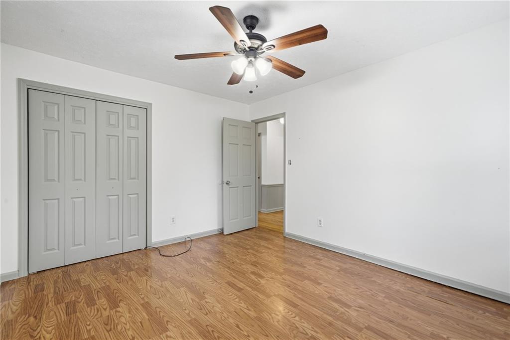 253 Newt Fowler Lane Canton, GA 30115 - Photo 29 of 35 wooden floor in an empty room