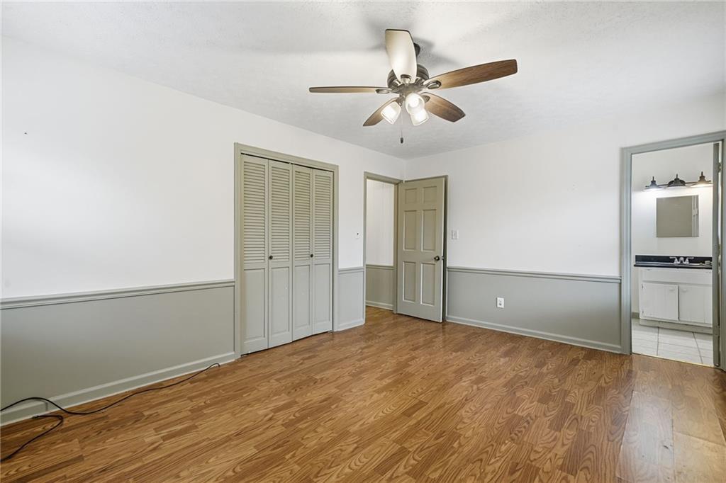 253 Newt Fowler Lane Canton, GA 30115 - Photo 33 of 35 wooden floor in an empty room