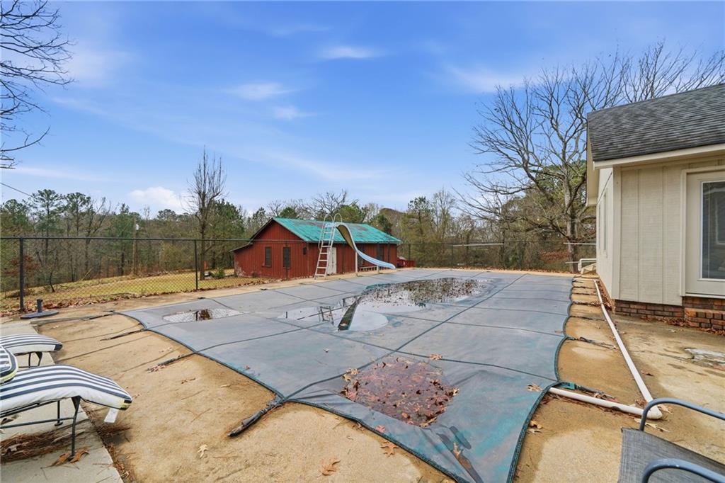 253 Newt Fowler Lane Canton, GA 30115 - Photo 7 of 35 a view of backyard with a patio