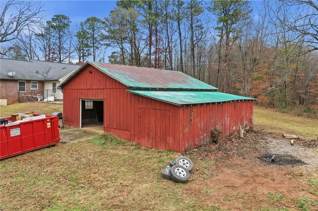 a aerial view of a house with a yard