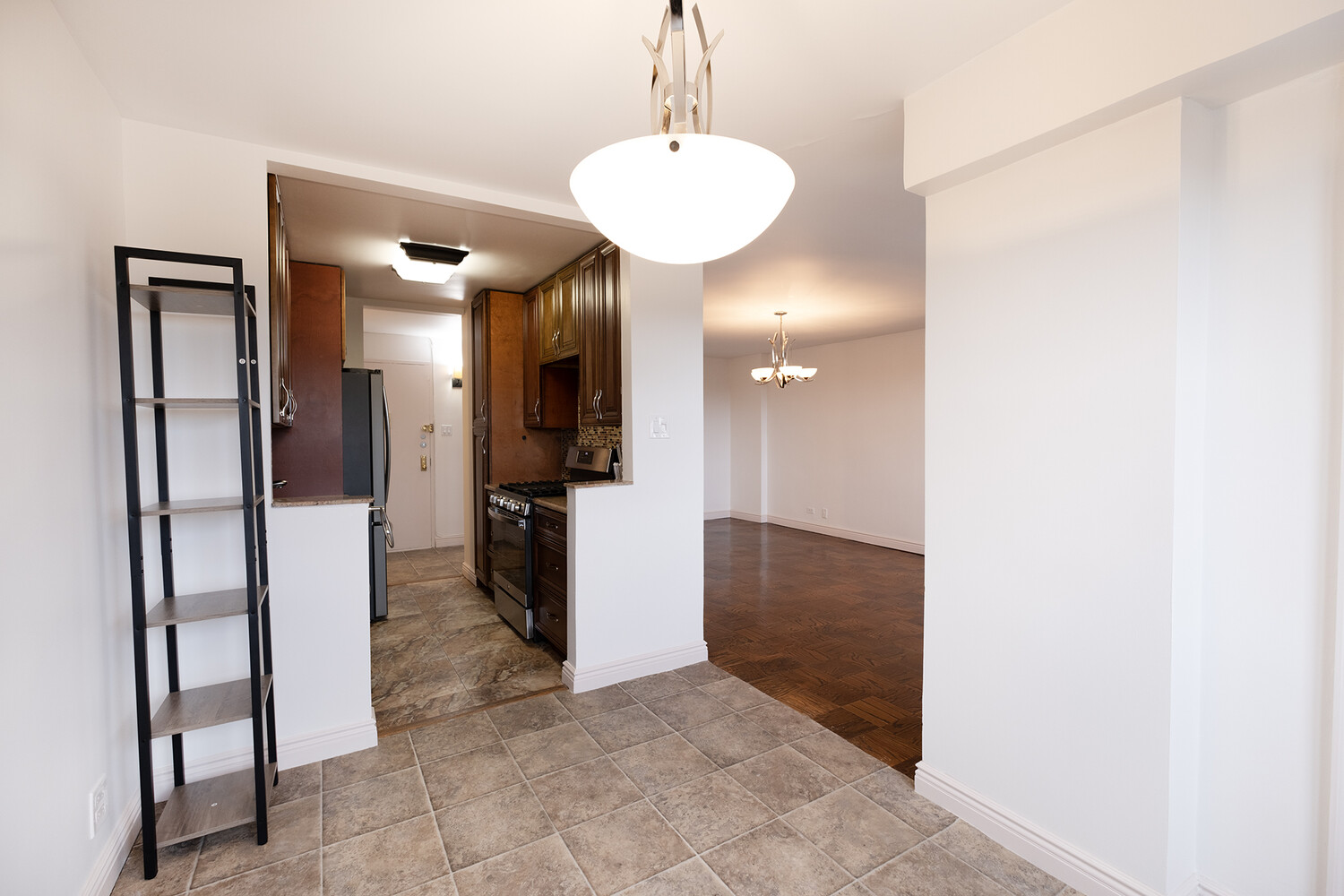 1401 Ocean Avenue, Unit 6H Brooklyn, NY 11230 - Photo 5 of 10 a view of a hallway with wooden floor