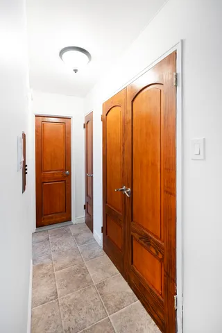 a view of bathroom with a tub and shower