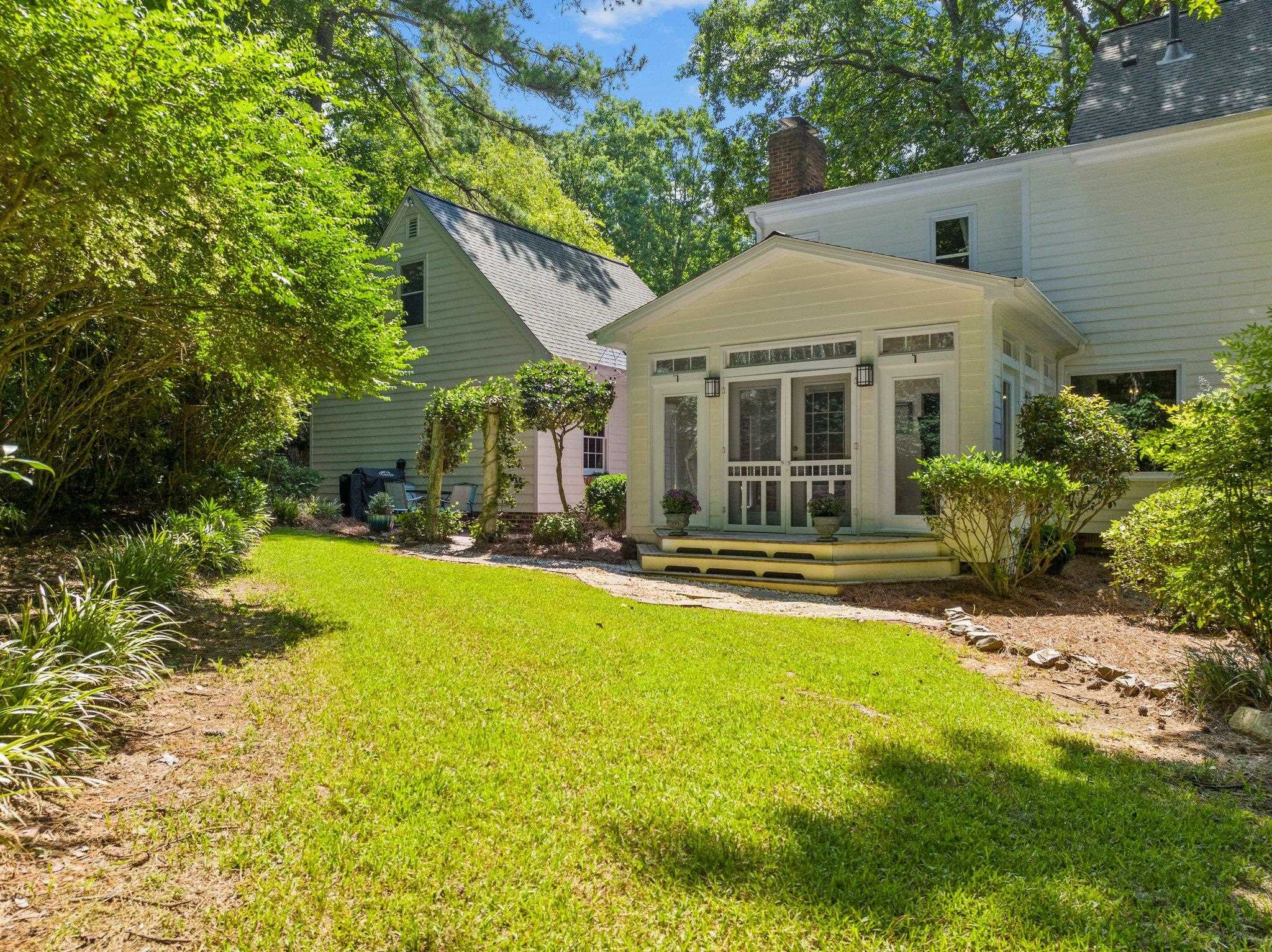 9301 Greenfield Drive Raleigh, NC 27615 - Photo 33 of 48 Located on 0.93 acres, this spacious backyard is full of possibilites. Exterior Back