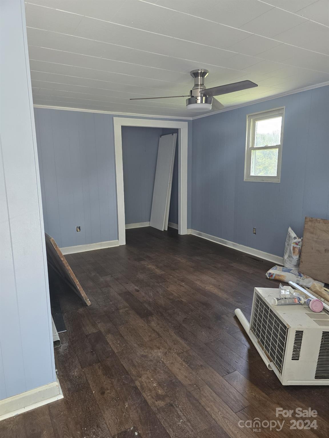 4080 Piney Road Morganton, NC 28655 - Photo 11 of 23 a view of workspace with wooden floor cabinet and windows