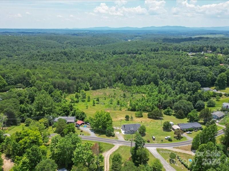 4080 Piney Road Morganton, NC 28655 - Photo 18 of 23 an aerial view of residential houses with outdoor space and trees