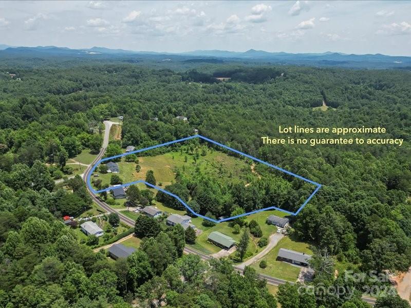 4080 Piney Road Morganton, NC 28655 - Photo 21 of 23 an aerial view of a house with a yard